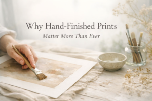 Hand-finished fine art print showing the artist’s hand and subtle surface texture